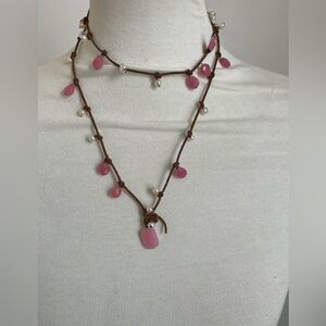 Pink and fresh water pearls on knotted Necklace on rawhide